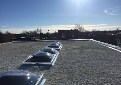 Installation de toiture asphalte et gravier sur toit plat - Toiture Roger Savoie